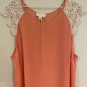 Forever 21 sheer tank top with lace shoulders.